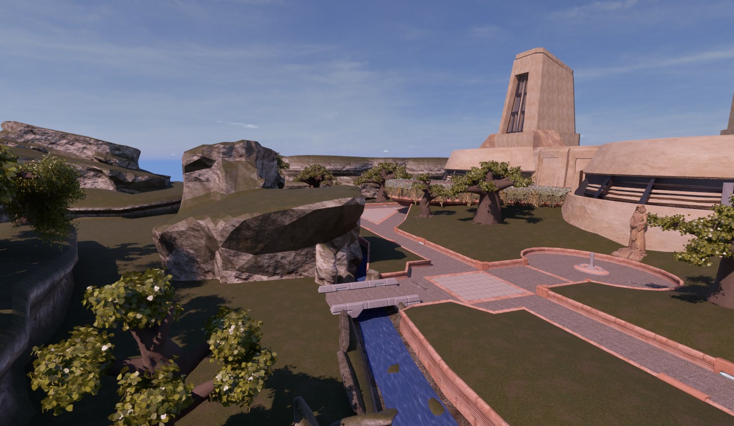 Finished Enclave grounds with landscaped paths, water, architecture, and terrain.