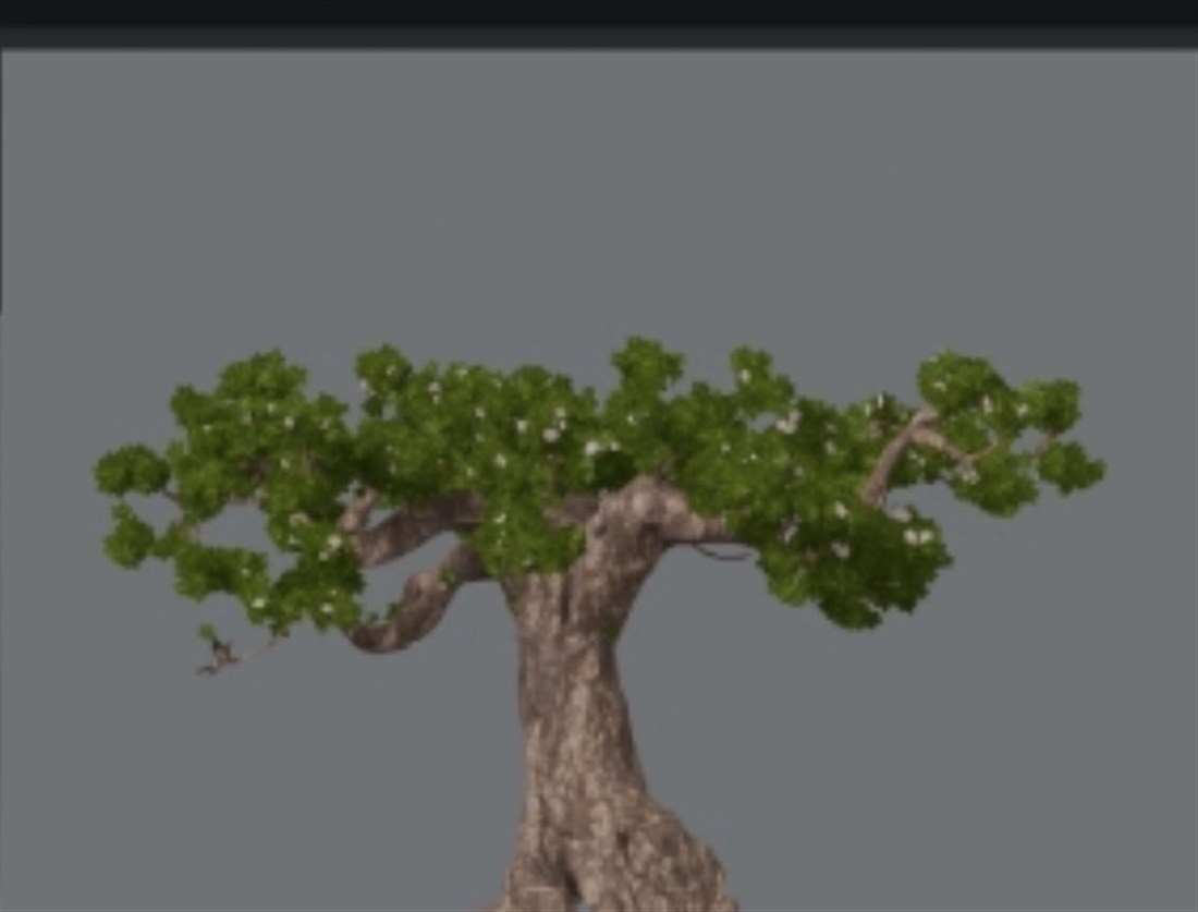 Finished Uneti tree with bark, foliage, and blossom materials.